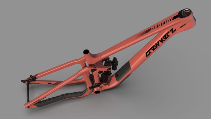 Cadre de vélo orange avec suspension intégrée.