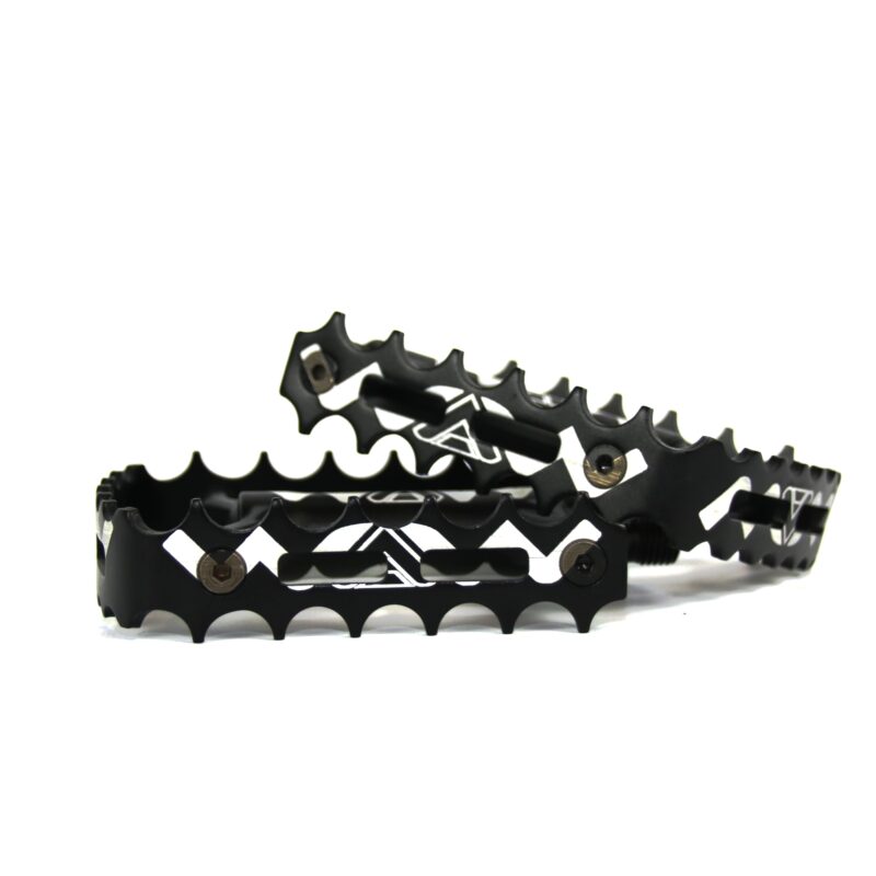 paire de pedales waw simple cage Pédales de vélo noires avec motifs géométriques.