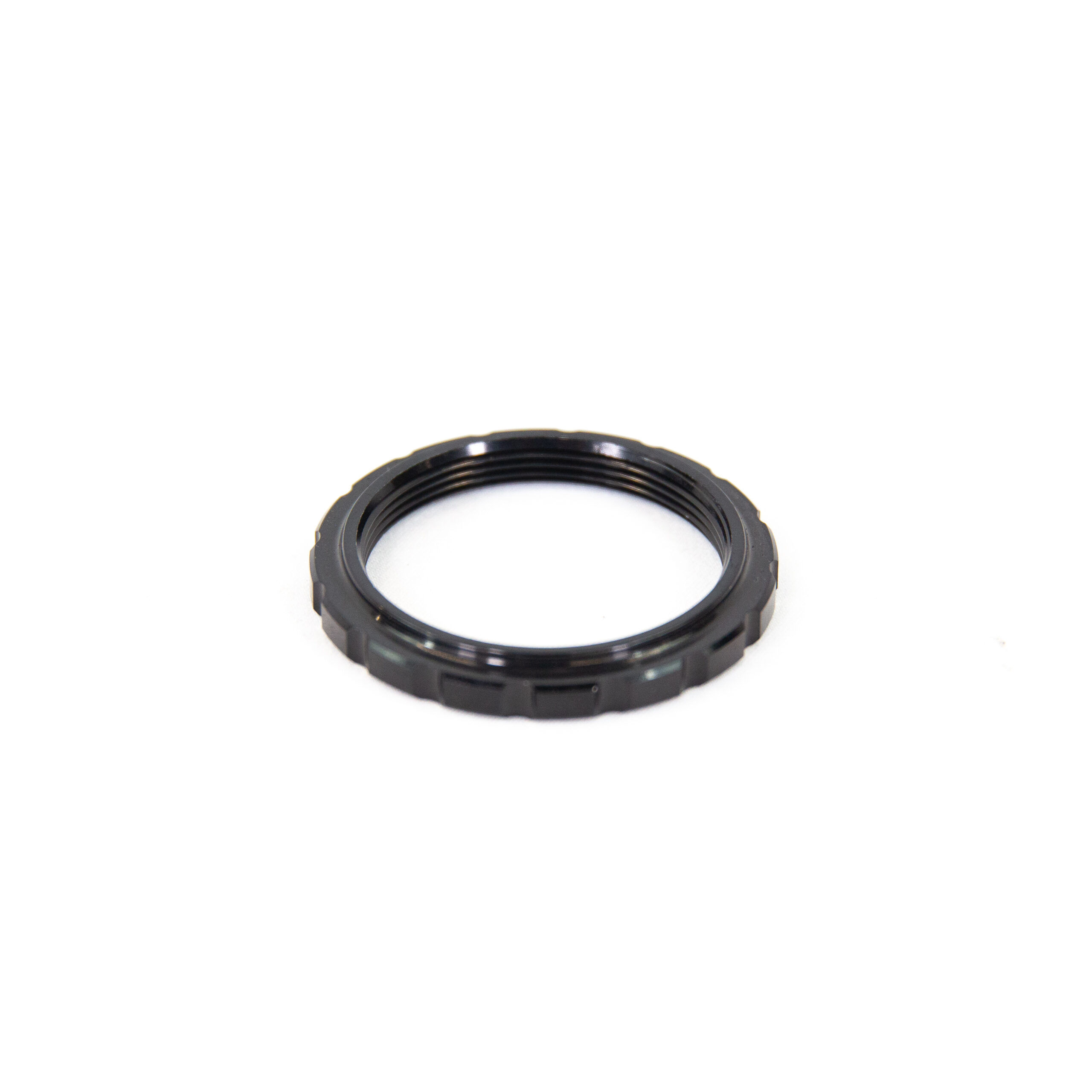 ecrou waw de roue libre/k7 noir as30 Anneau métallique noir sur fond blanc.