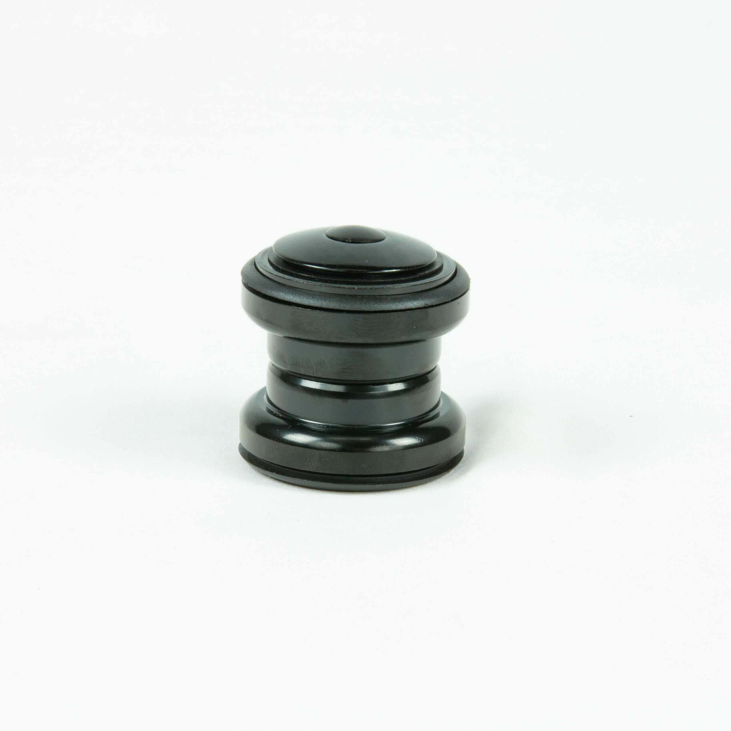 jeu de direction external expert Pièce cylindrique noire sur fond blanc.