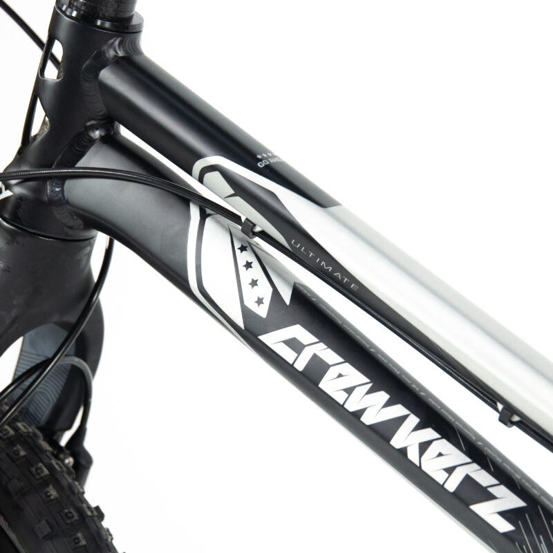 Cadre de vélo noir avec logo et étoiles.