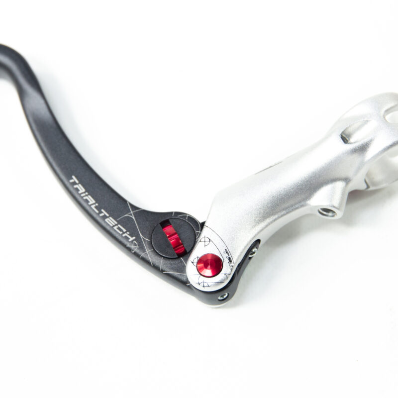 Levier de frein Trialtech métallique et rouge.